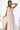 Numoco 362-8 JUSTINE Long dress with a neckline and a tie at the back - beige with glitter-3