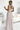Numoco 362-8 JUSTINE Long dress with a neckline and a tie at the back - beige with glitter-2